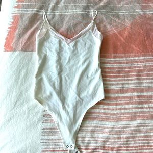 Abercrombie & Fitch body suit. Size XS. Never worn. New condition.